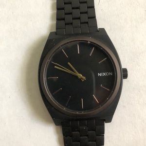 Nixon watch all black and gold
